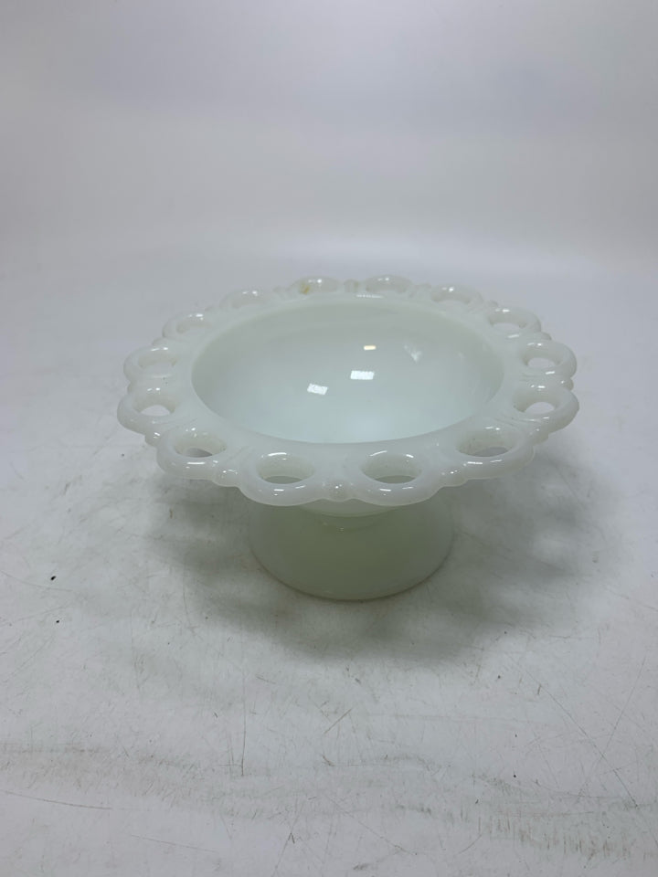 FOOTED MILK GLASS CANDY DISH W/ PIERCED EDGE.