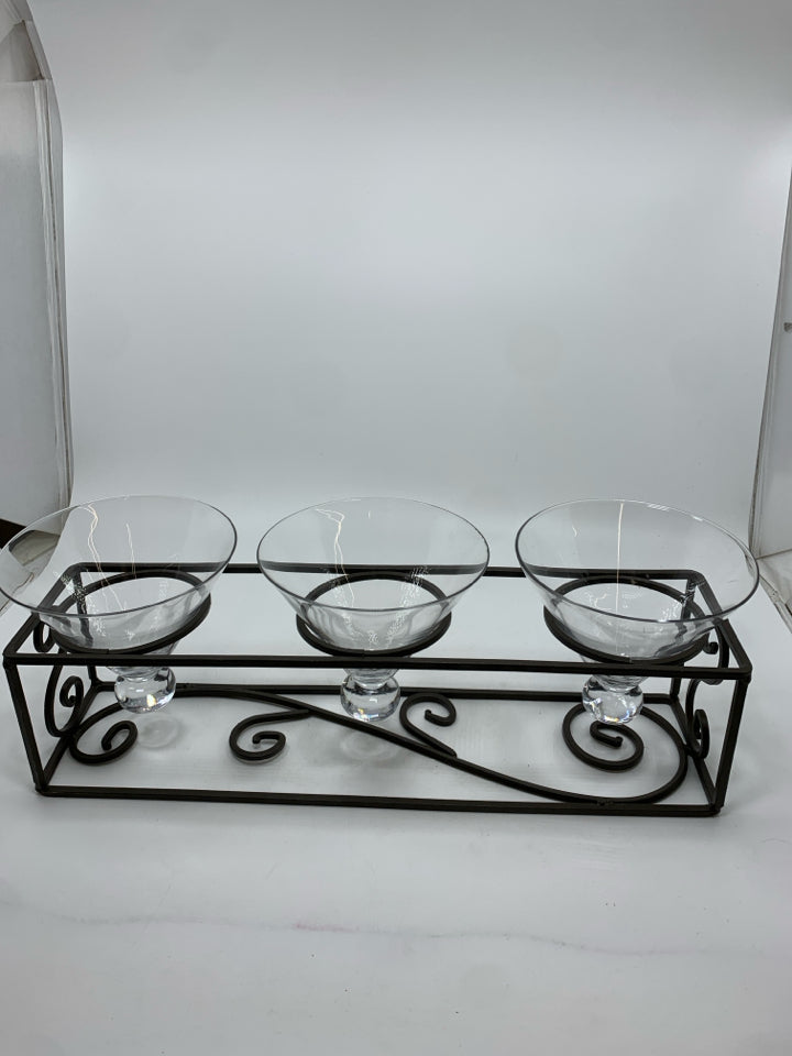 VTG BLACK METAL IRON CADDY W/GLASS CANDLE HOLDERS.