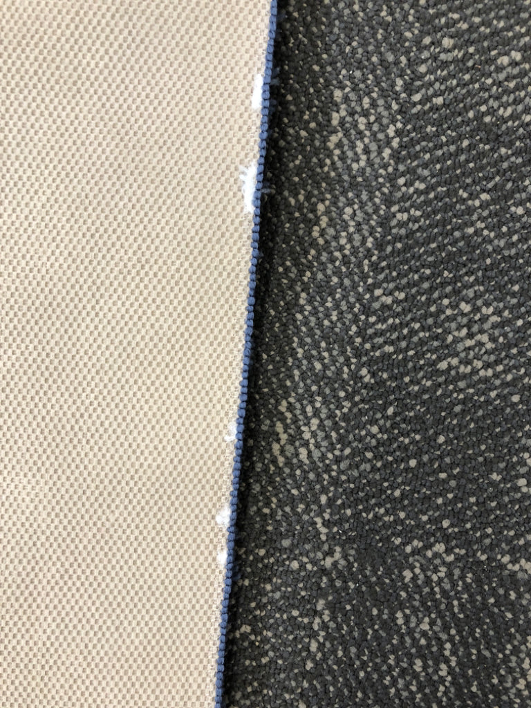 BLUE DINOSAUR WASHABLE RUG.