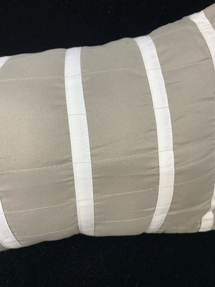 SKINNY GREY PILLOW W/ WHITE STRIPES.