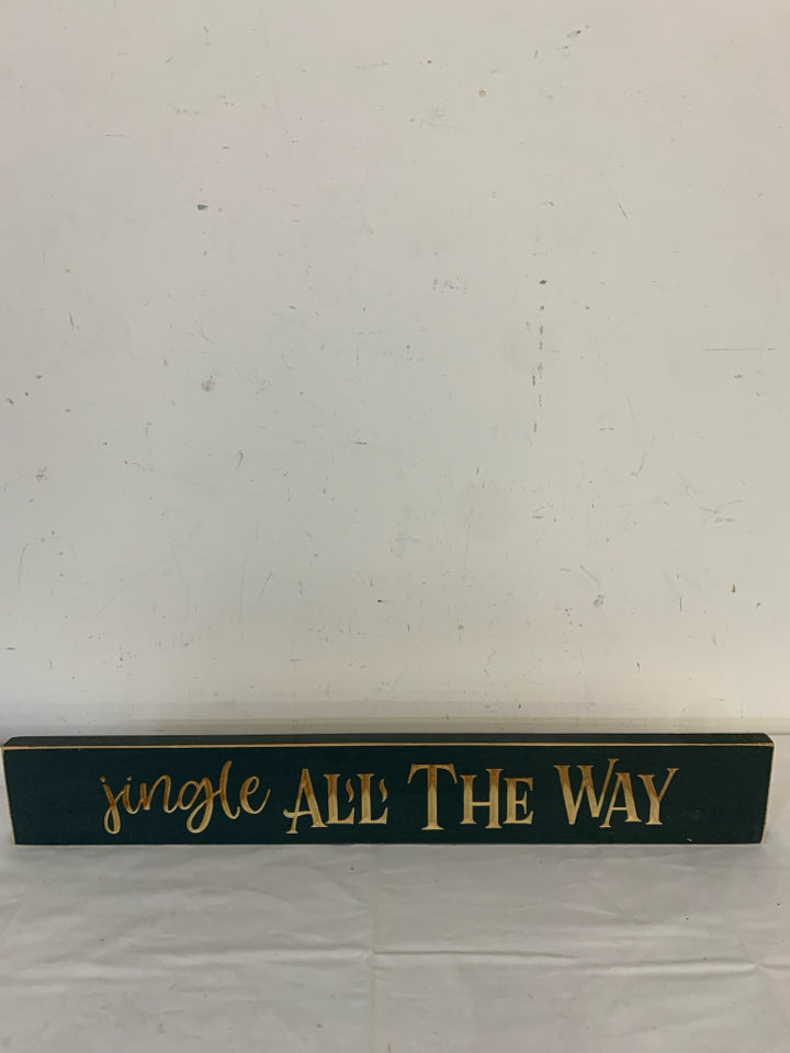 CARVED "JINGLE ALL THE WAY" DARK GREEN WALL ART.