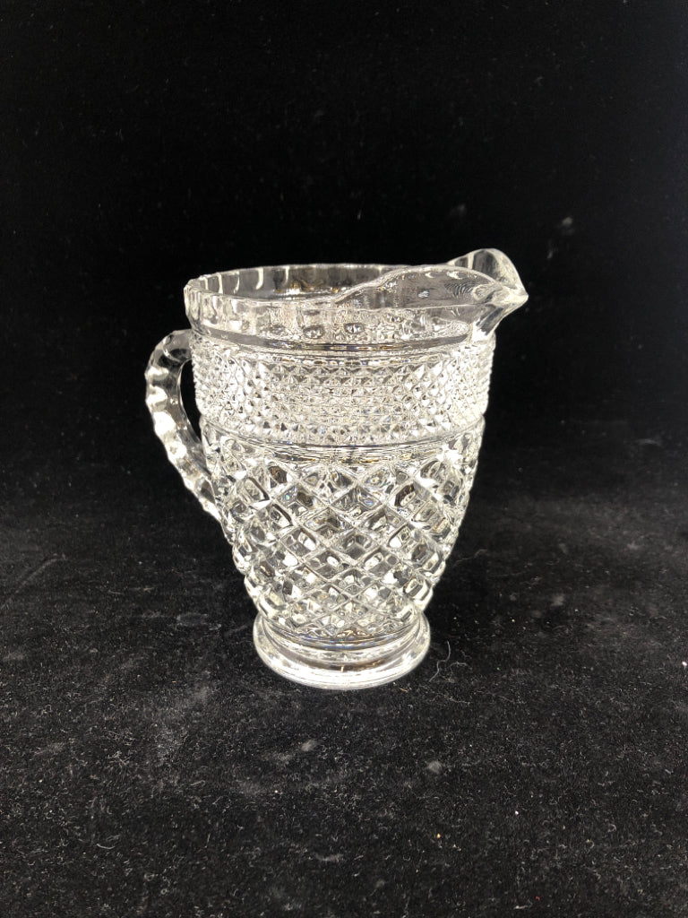 SMALL CLEAR CUT GLASS PITCHER.