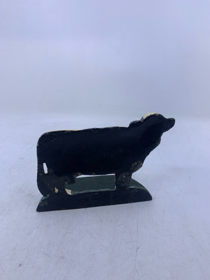 HEAVY METAL COW DOOR STOP.