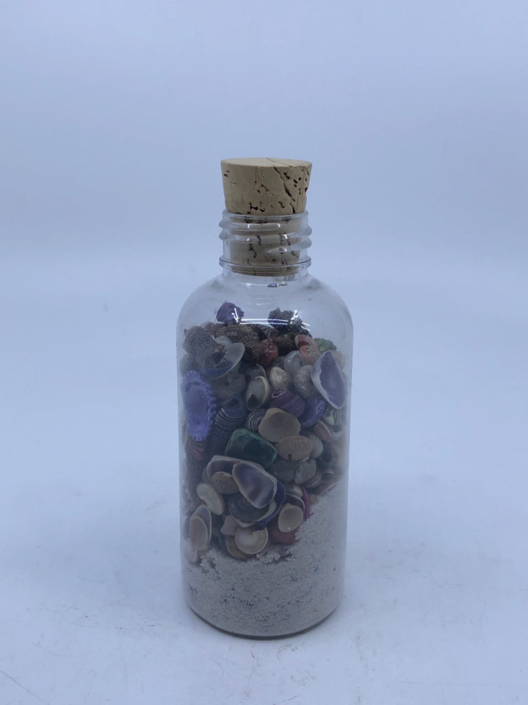 JAR OF SAND W SHELLS.