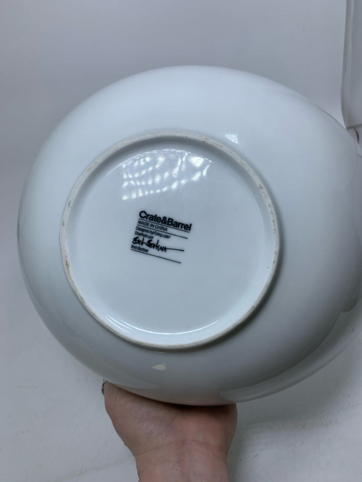 FOOTED OVAL SLANTED SIDES SERVING BOWL.