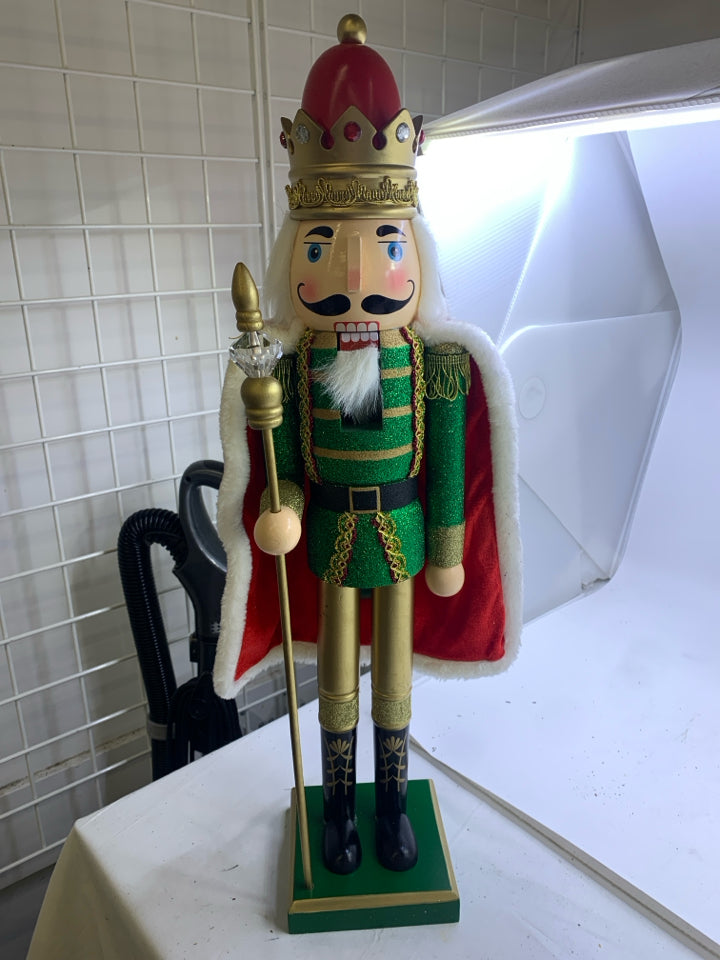 LARGE GREEN GLITTER NUTCRACKER W/CAPE.