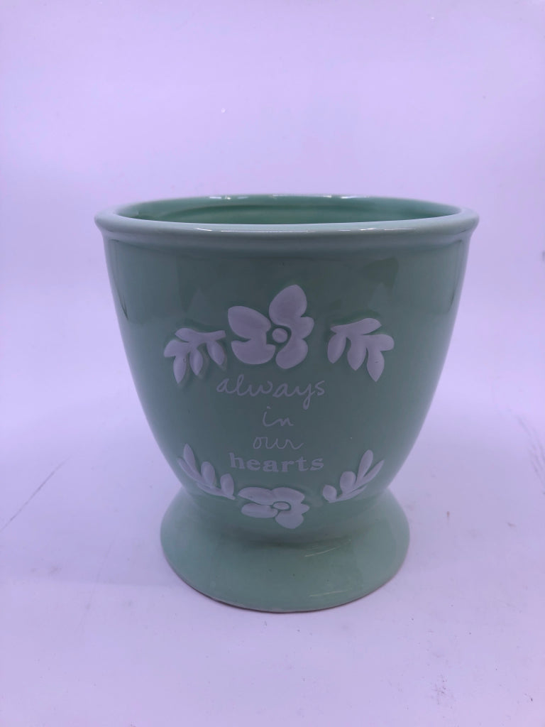 "ALWAYS IN OUR HEARTS" LIGHT GREEN SHORT PEDESTAL VASE.