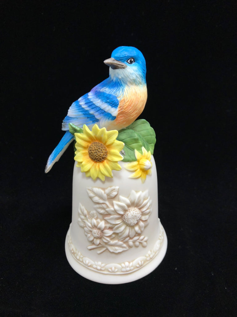 PORCELAIN BLUE BIRD ON FLORAL BELL FIGURINE.