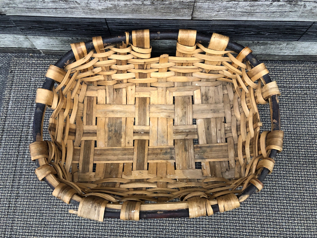 LARGE OVAL THICK WOVEN BASKET.