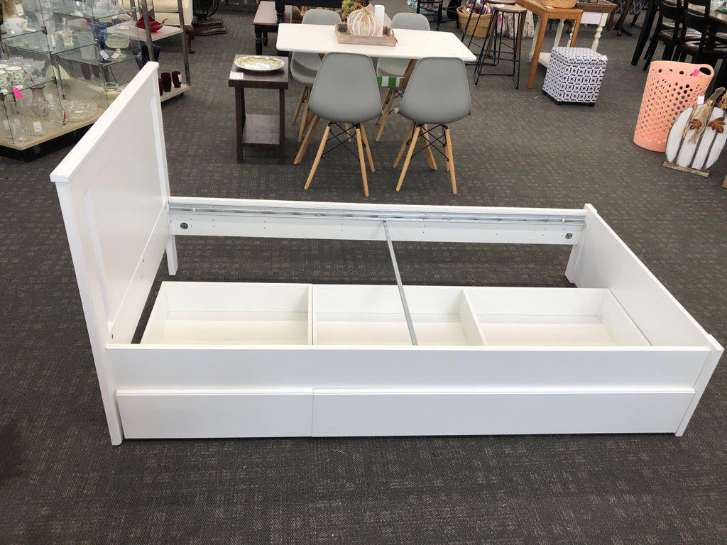 WHITE WOOD TWIN BED W/2 ROLLING DRAWERS.