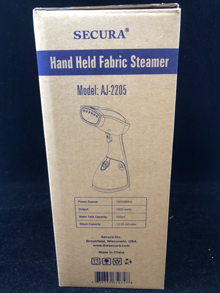 NIB HAND HELD FABRIC STEAMER SECURA.
