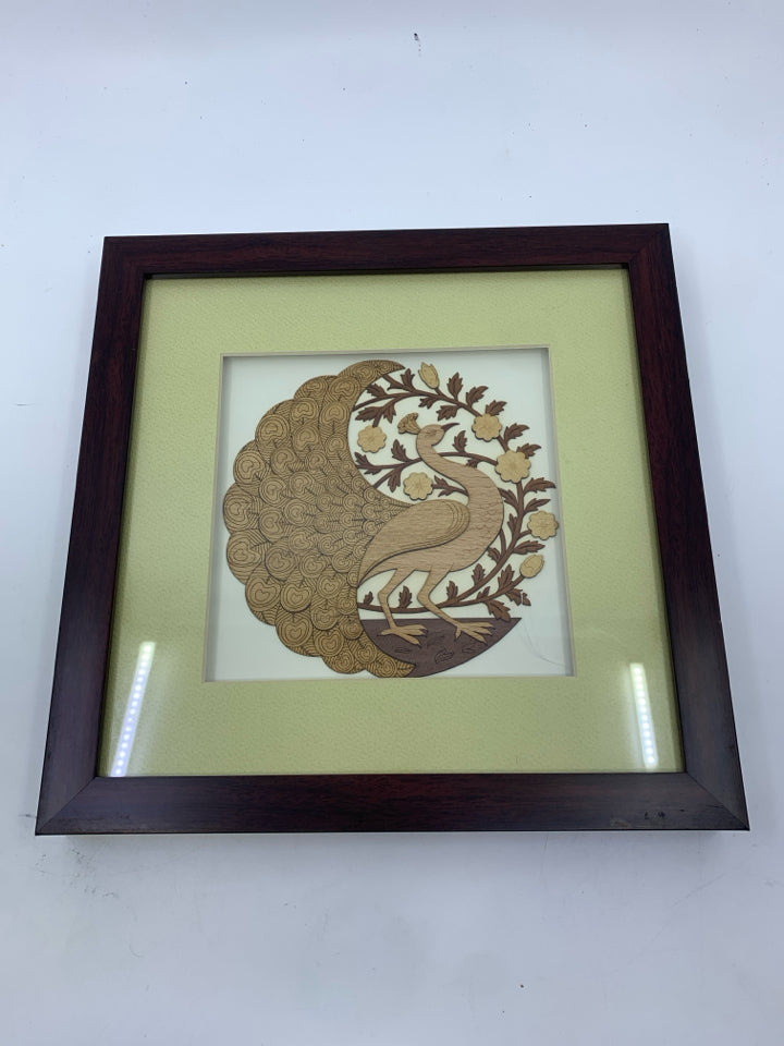 PEACOCK WOOD CARVING IN DARK FRAME WALL HANGING.