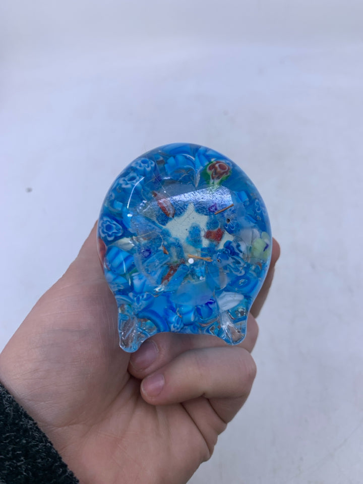 BLUE SITTING ELEPHANT W/ TRUNK UP.