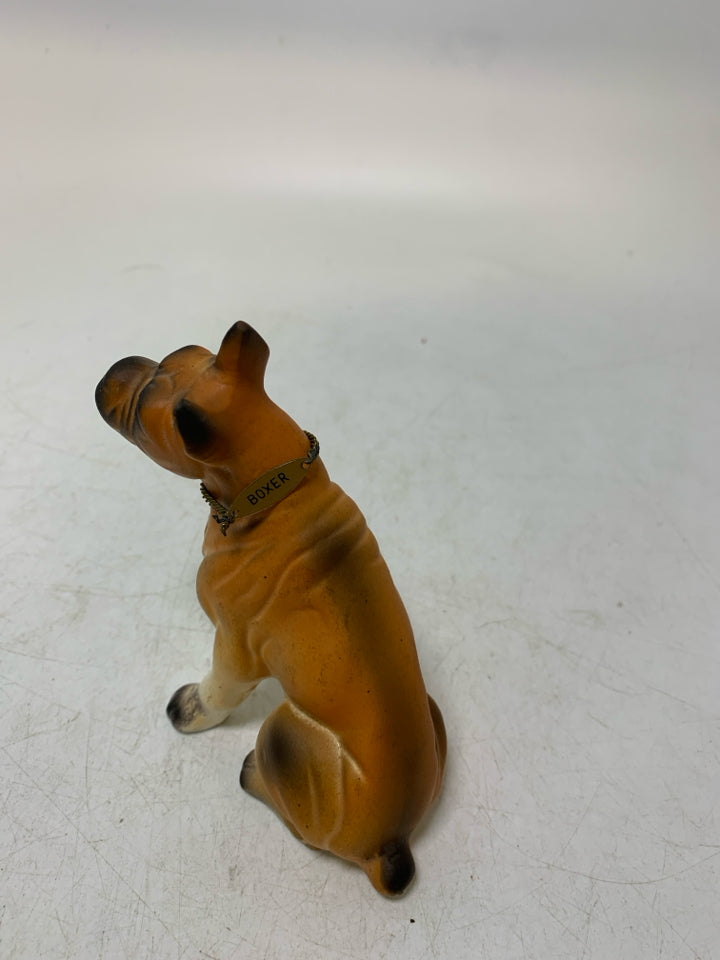 TAN LIGHTWEIGHT SITTING BOXER FIGURINE.