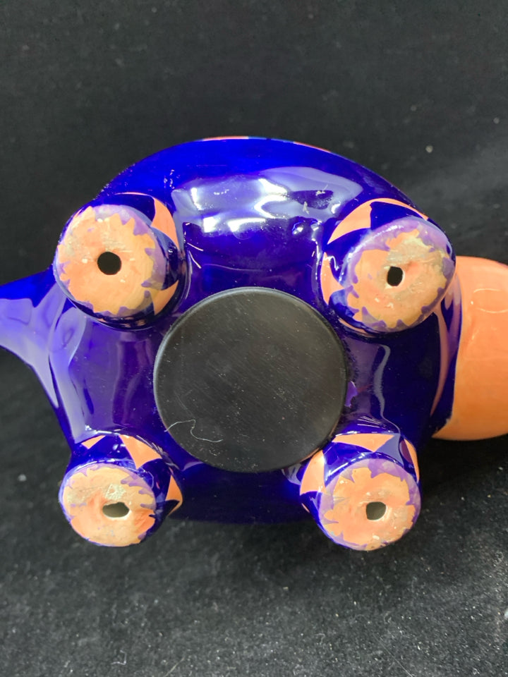 COLORFUL PAINTED DINOSAUR BANK.