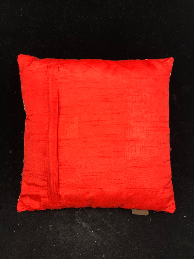 ORANGE AND RED SQUARE PILLOW.