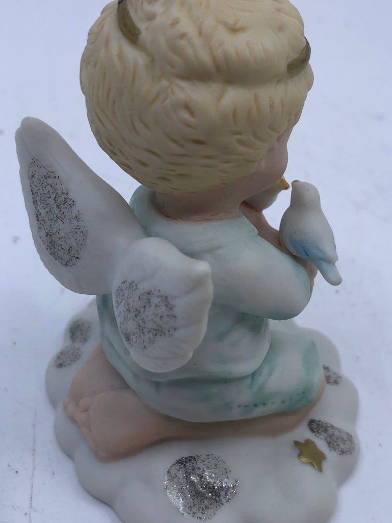 CHERUB HOLDING BIRDS.