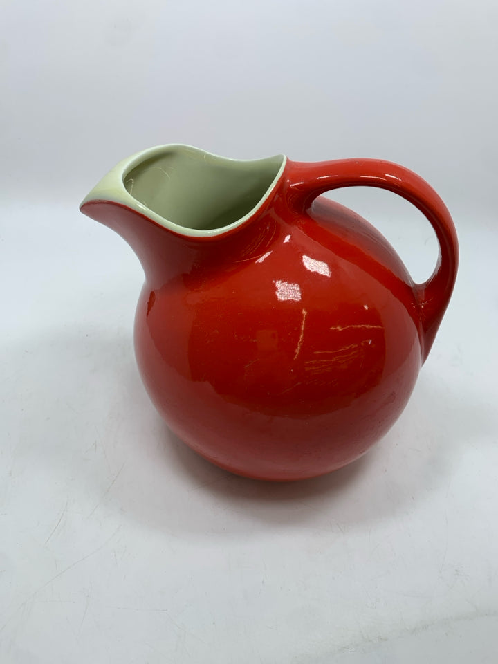 VTG RED CERAMIC PITCHER WITH ICE LIP.