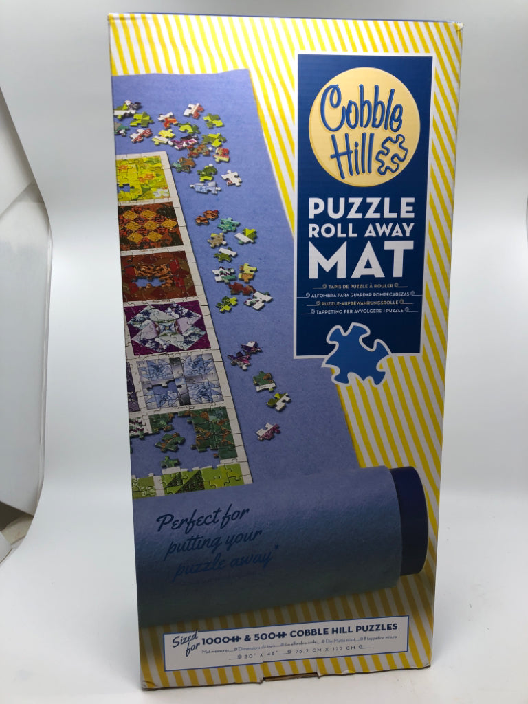 NIB PUZZLE ROLL AWAY MAT.