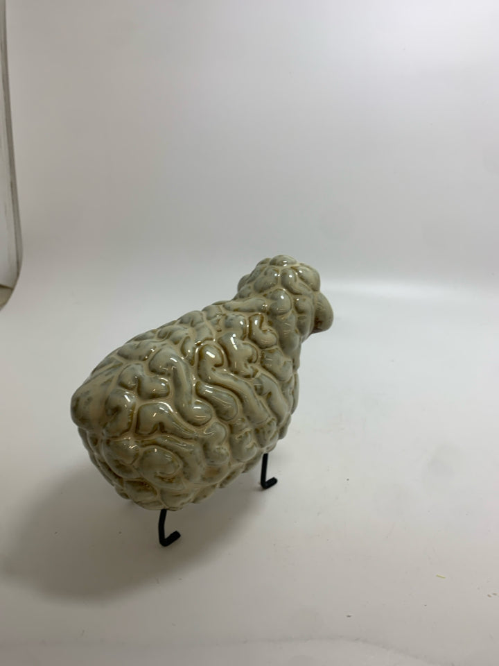 GLAZED SHEEP DECOR W/METAL LEGS.