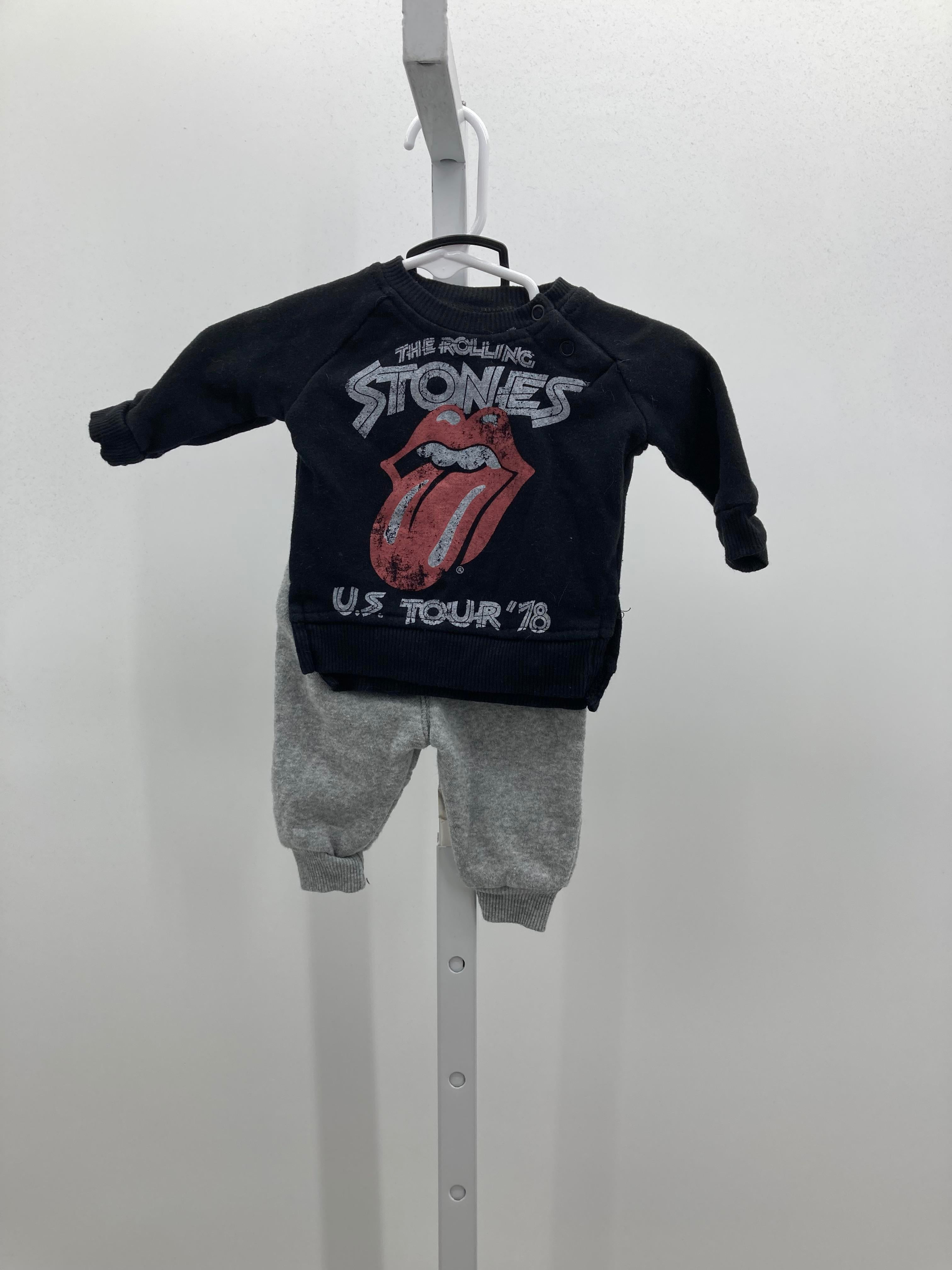 US TOUR 78 SHIRT AND GREY PANTS.