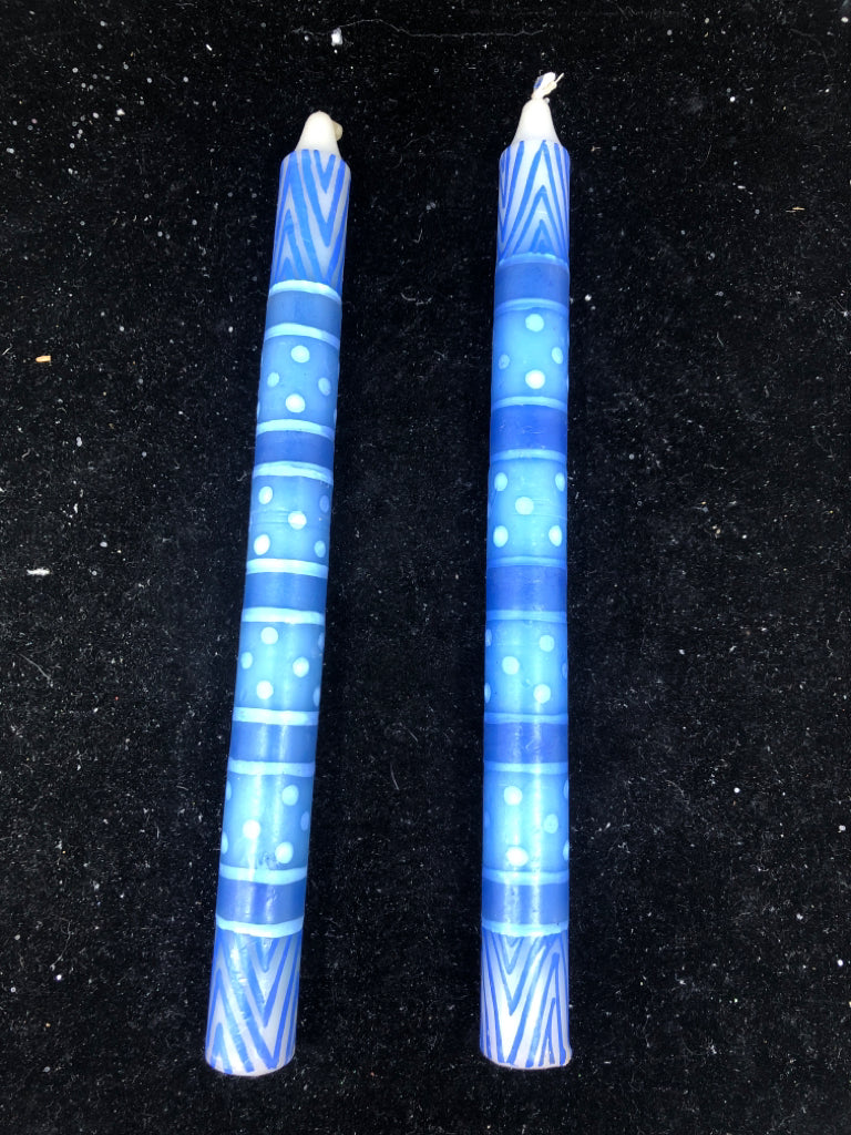 2 BLUE TAPER CANDLES.