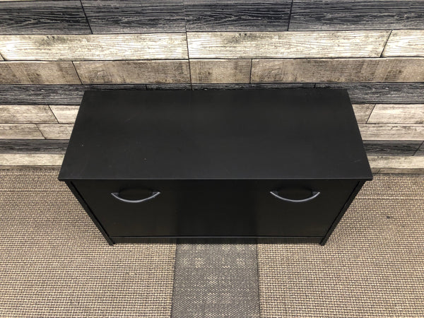 BLACK HIDDEN SHOE STORAGE CABINET.