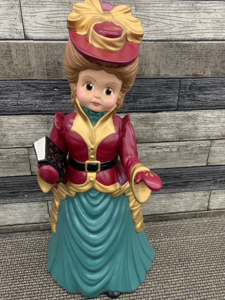 VTG LARGE WOMAN CAROLER FIGURE.