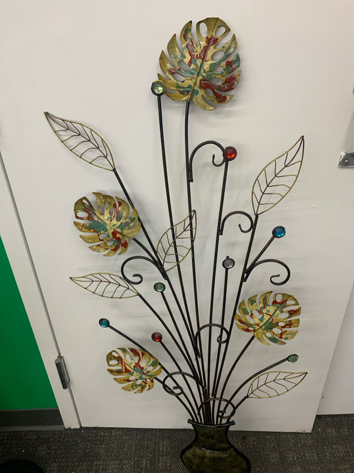 METAL LEAVES AND POT W/JEWELS WALL HANGING.