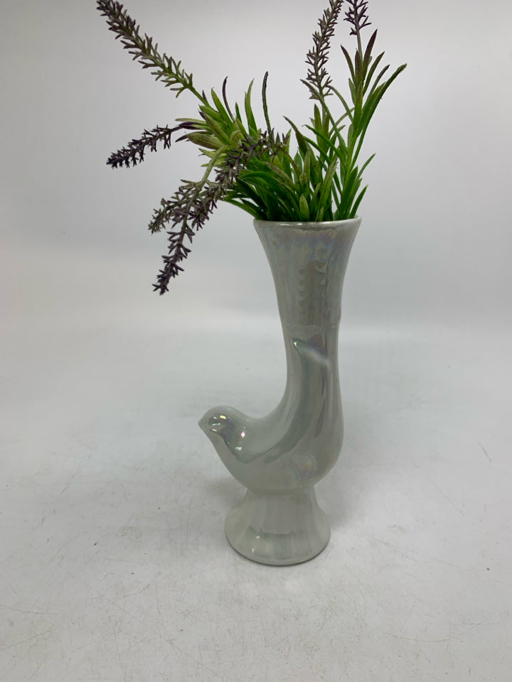 IRIDESCENT BIRD SHAPED VASE W/ FAUX GREENS.