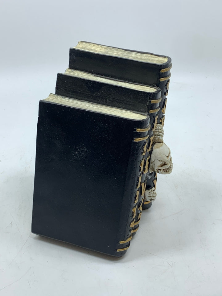 SKELETON BOOK STACK.
