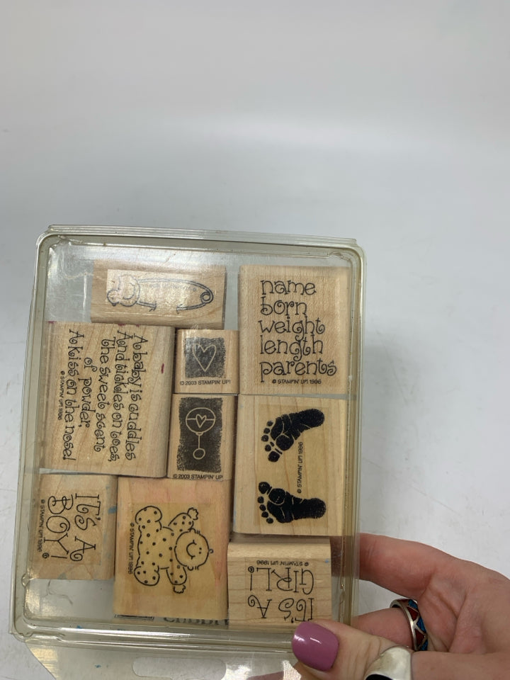 STAMPS IN CASE.
