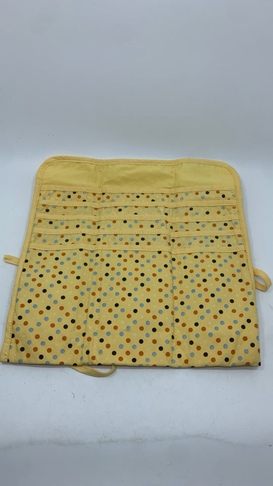 YELLOW W/POLKA-DOT BRUSH CARRIER.