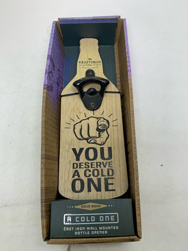NIB YOU DESERVE A COLD ONE BEER BOTTLE SHAPED WALL HANGING OPENER.
