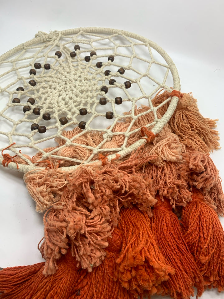 MACRAME DREAM CATCHER W/PEACH TASSELS.