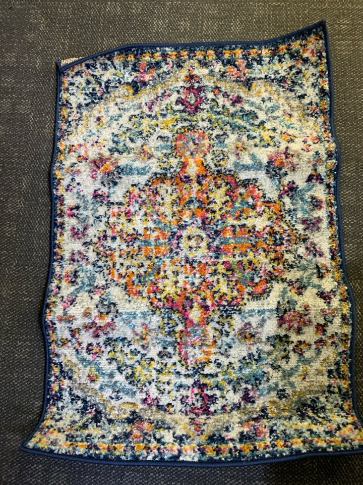 LIVABLISS HARPUT COLORFUL AREA RUG.