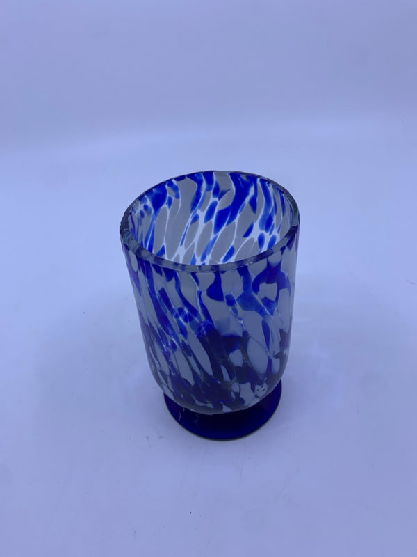 BLUE AND WHITE FOOTED BLOWN GLASS CANDLE HOLDER.