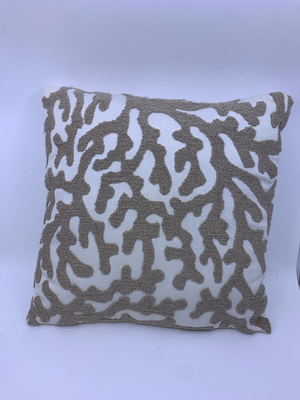 TAN AND WHITE CORAL PATTERN SQUARE PILLOW.