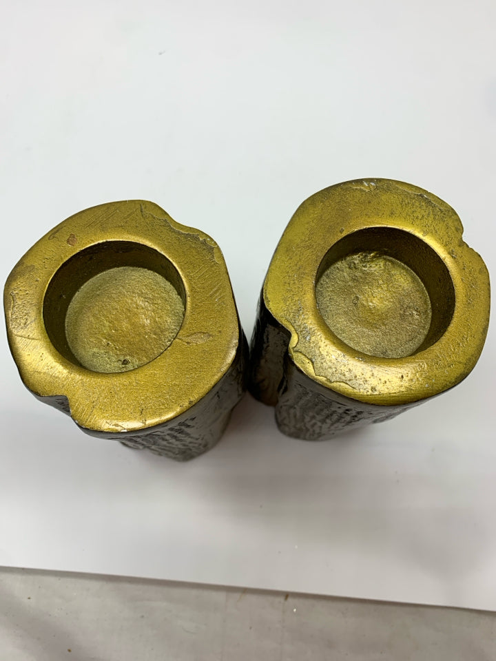 2 GOLDEN METAL TREE STUMP VOTIVE HOLDERS.