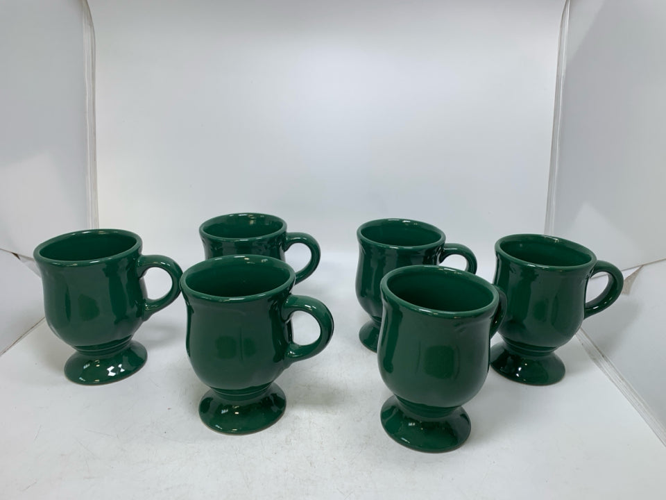 6 DARK GREEN FOOTED MUGS.