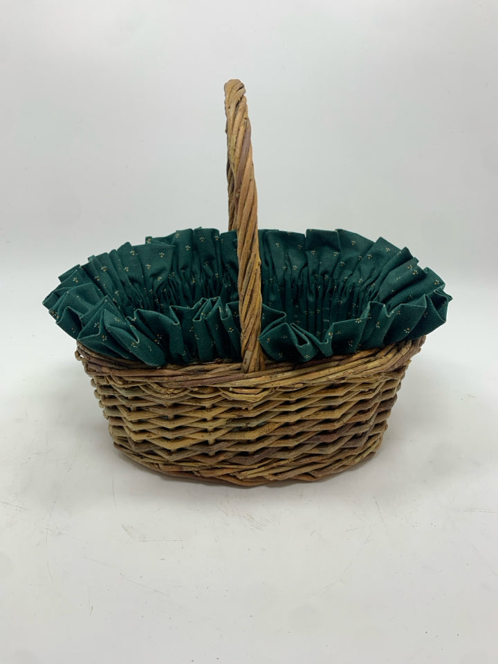 OVAL BASKET W/GREEN FABRIC LINER.