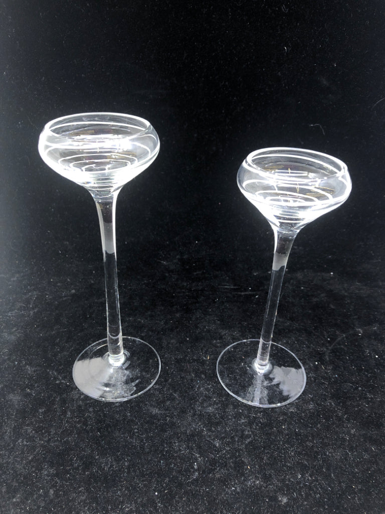 2 FOOTED GLASS TEA LIGHT HOLDERS W/ WHITE SWIRL.