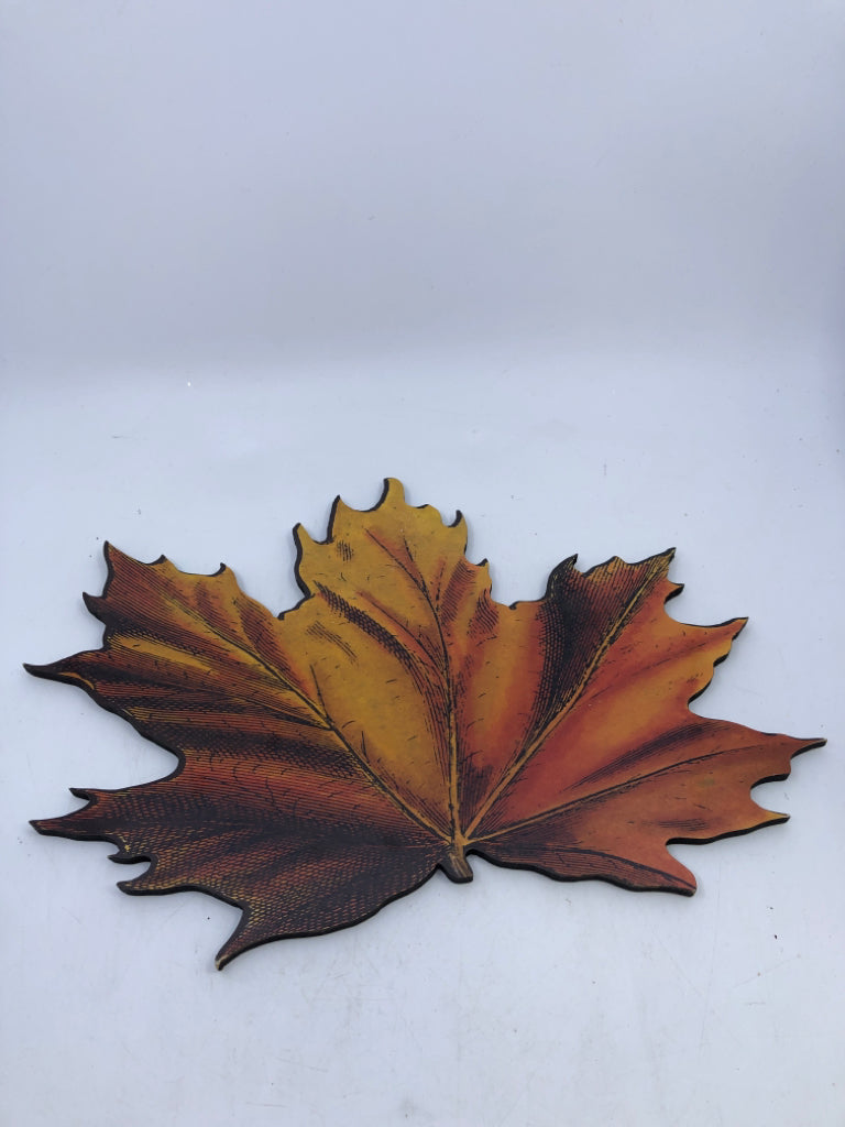 ORANGE MAPLE LEAF TRIVET.