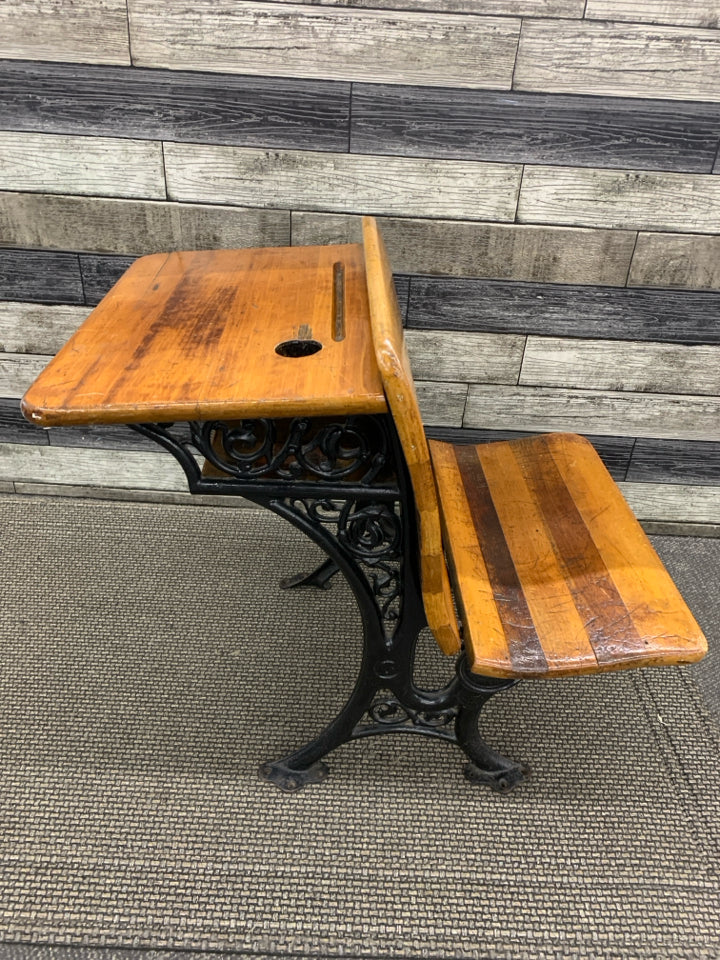 VTG ANTIQUE SCHOOL DESK W/ORNATE CAST-IRON BASE.