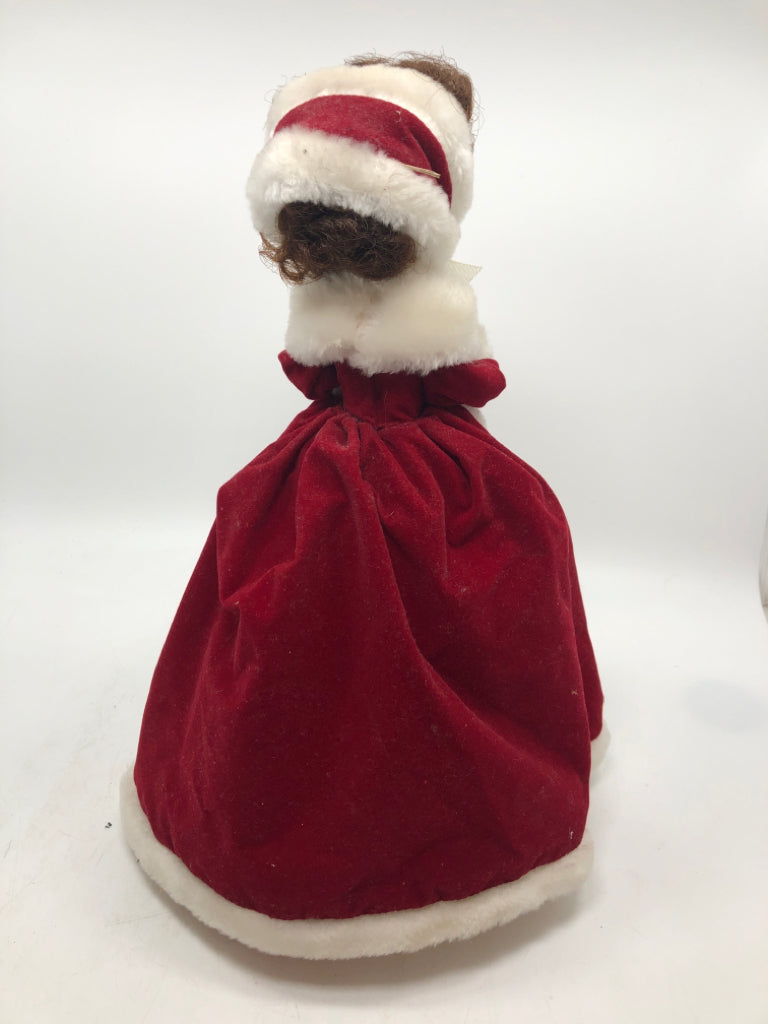 MUSICAL SPINNING DOLL LADY IN CLOAK.