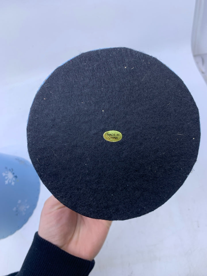 LIGHT BLUE METAL CANDLE HOLDER/SHADE W/ PIERCED SNOWFLAKES.