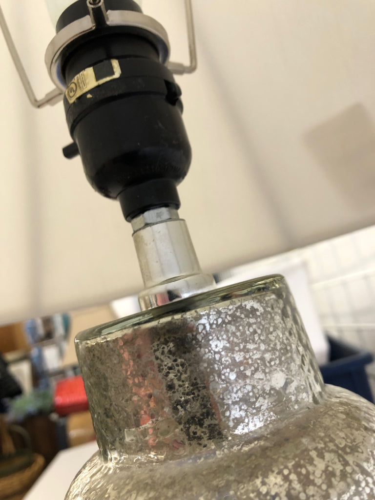 TEXTURED MERCURY GLASS BASE LAMP W/WHITE SHADE.