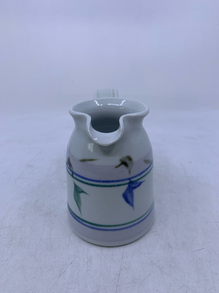 WHITE PITCHER W/ BLUE/GREEN STRIPES LONG HANDLE.