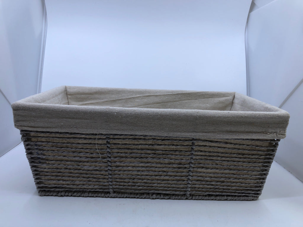 FABRIC LINED RECTANGLE WICKER BASKET.