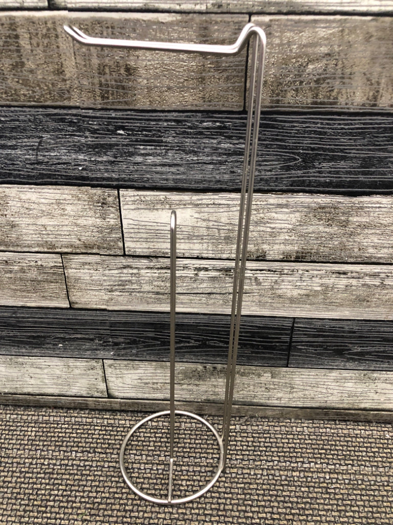 SILVER TOILET PAPER HOLDER.